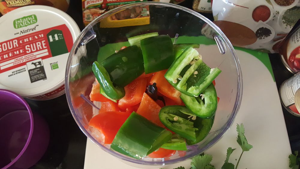 Getting the peppers ready to chop.
